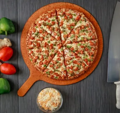 Butter Chicken Pizza at Pizza 64 Saddlepeace Calgary